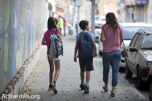הורים וילדים בדרך לבית הספר (אורן זיו/אקטיבסטילס)