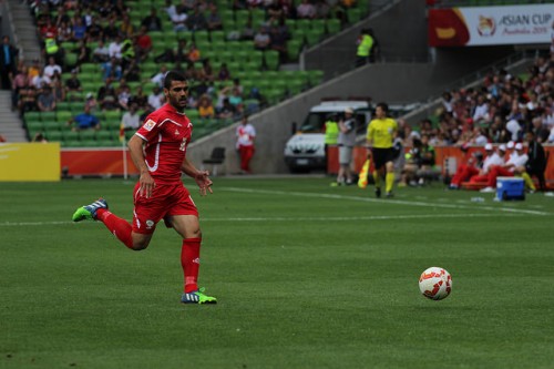 שחקן נבחרת פלסטין בכדורגל במהלך גביע אסיה (צילום: Nasya Bahfen פליקר CC BY-ND 2.0)