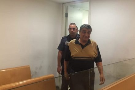 רג'א אגבאריה מובא לדיון בהארכת מעצרו בבית משפט השלום בחיפה. (יואב חיפאווי)
